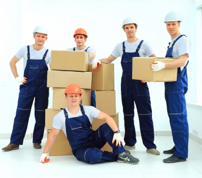 Professional movers assisting with a residential move in Chiswick