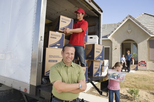 Professional movers handling furniture