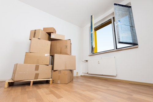 Professional movers handling furniture pick-up in Chiswick