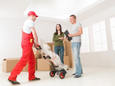 Happy customers with their successful move by Removals Chiswick